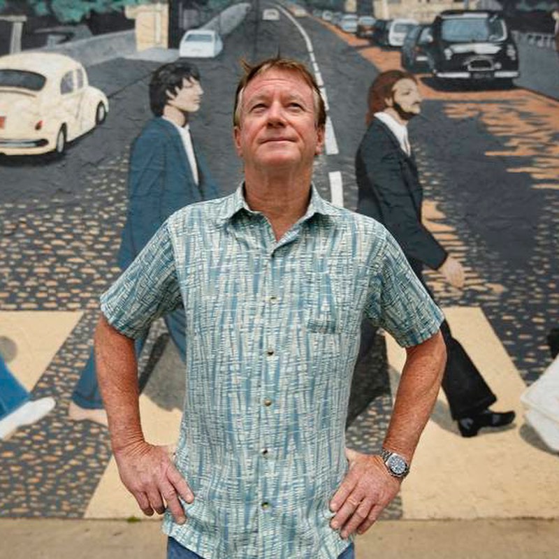 Bill Dillon, owner of Abbey Road and Lucy's Sky Bar, standing in front of Abbey Road's building